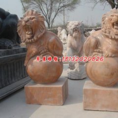 踩球獅子雕塑，晚霞紅石雕西洋獅